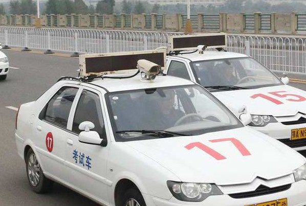 江苏驾校教练用无人机为二百多位学员作弊,他会被判刑吗?