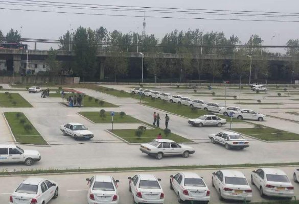 江苏驾校教练用无人机为二百多位学员作弊,他会被判刑吗?