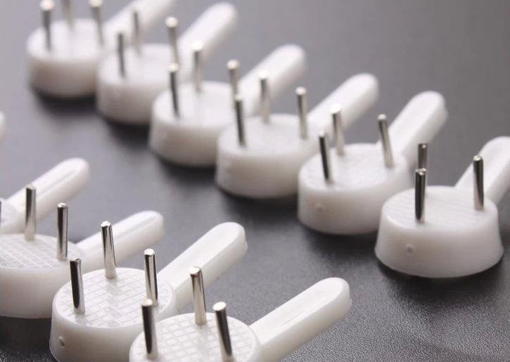 装相框的钉子怎么用啊？