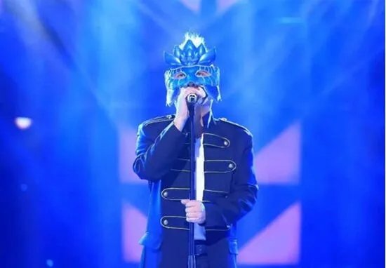 莲花被戴军认出 揭秘蒙面歌王李春波退赛原因