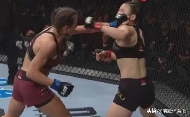 张伟丽和乔安娜的UFC冠军赛中，乔安娜一度像稳拿冠军一样笑着炫耀，具体是怎么回事？